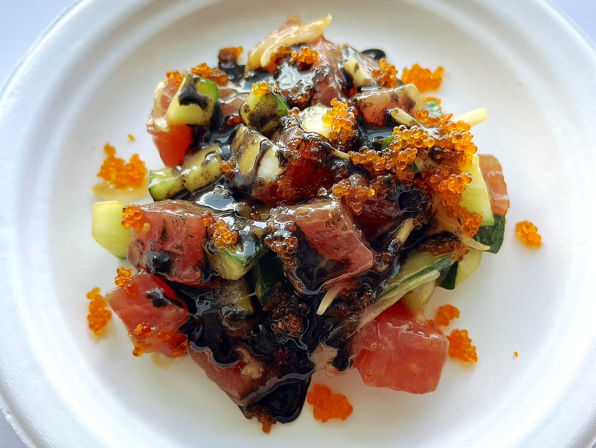 white plate topped with colorful mixed poke