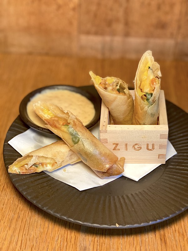 crispy spring rolls sliced on the diagonal