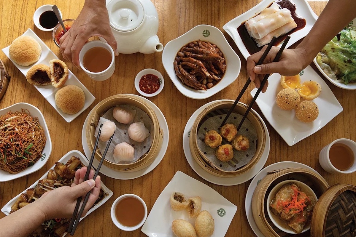 assortment of dim sum dishes on a table