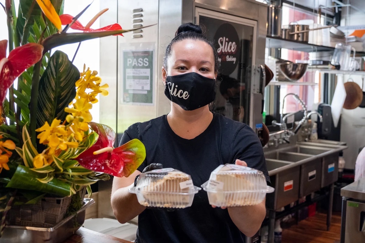 heather lukela of slice by hb baking in her dessert shop